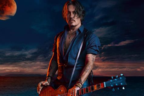 sauvage advert johnny Depp guitar